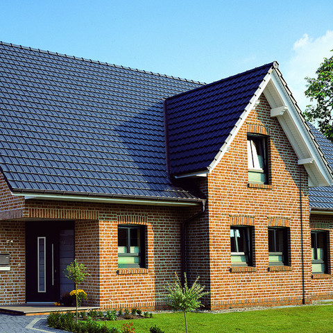 Single-family houses made of Moorbrand lehm shaded brick