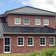 A single-family house covered with shaded black matte